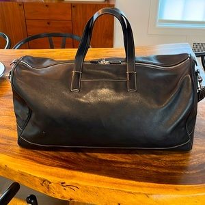 Coach black leather duffel bag